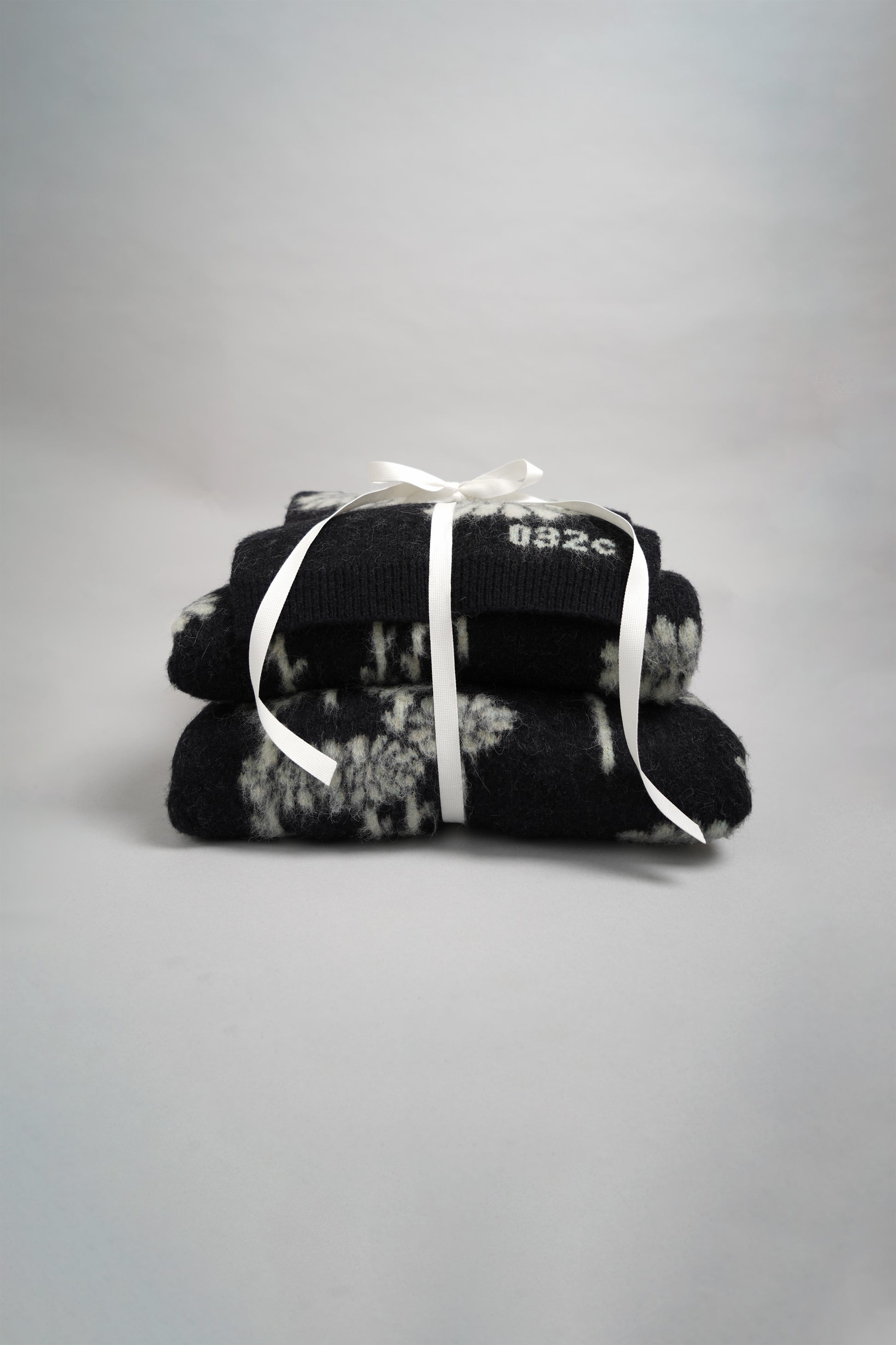 "MELTING DAISIES" KNIT LS POLO SHIRT